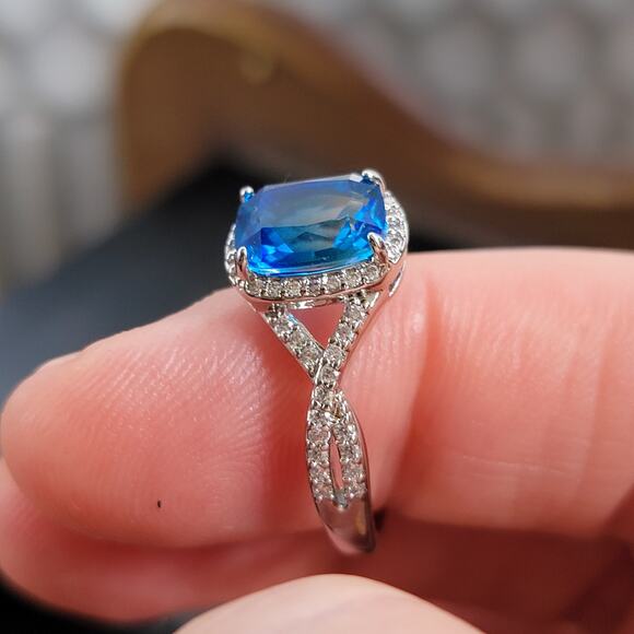 Rhodium Plated Simulated Sapphire Ring - Size 9 - Exquisite Crossover Design - Picture 12 of 12